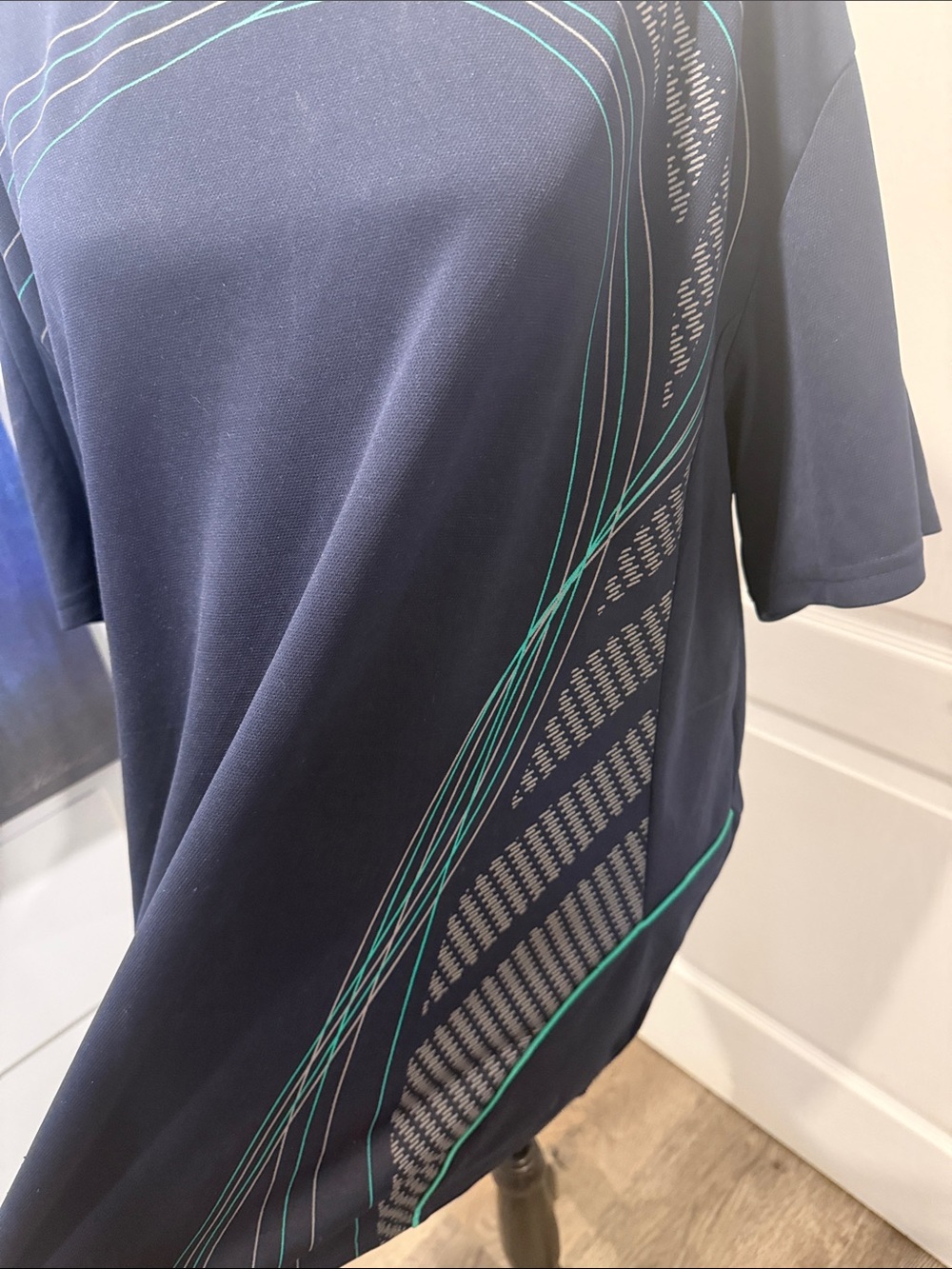 FILA Navy Short Sleeve Tee with Teal Graphic Accents - Picture 2 of 5